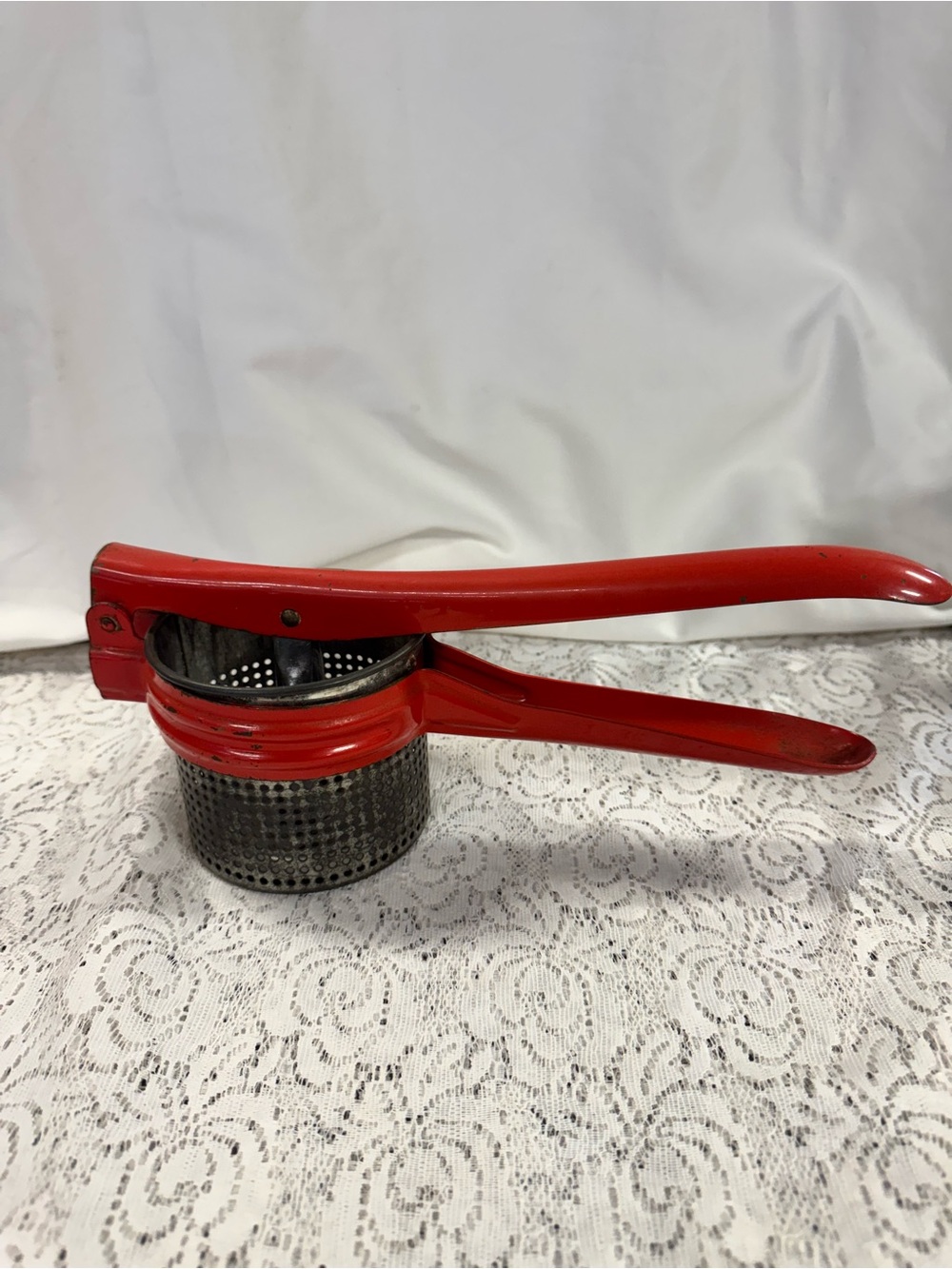 Red Handheld Potato Press- Home Accents